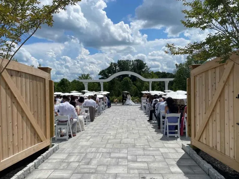 Couple exchanging vows at a beautiful outdoor wedding ceremony in a garden